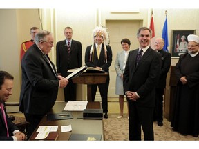 Alberta Premier Jim Prentice was sworn in by then Lt.-Gov. Donald S. Ethell  at Government House in Edmonton on Sept. 15, 2014.