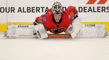 Calgary Flames goalie Karri Ramo warms up pre game before taking on the Colorado Avalanche during pre-season action at the Scotiabank Saddledome.