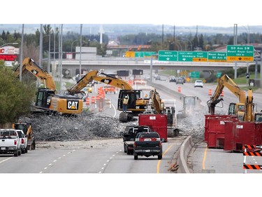 Construction crews worked to dismantle the Flanders Avenue bridge over Crowchild Trail on September 6, 2015 to make way for a new overpass.