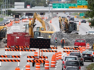 Construction crews worked to dismantle the Flanders Avenue bridge over Crowchild Trail on September 6, 2015 to make way for a new overpass.