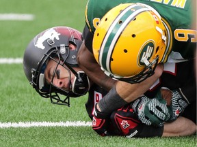 Calgary's Greg Wilson scores a touchdown  during the first half of the Labour Day Classic at McMahon Stadium last year.