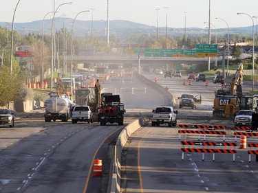 Construction crews continued the clean-up after demolishing the Flanders Avenue bridge over Crowchild Trail on September 7, 2015 to make way for a new overpass.