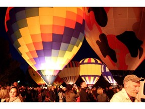 Hot air balloons light up the sky at the Balloon Glow in High River on September 25, 2015.