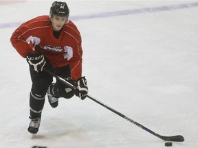 Calgary Hitmen defenceman Travis Sanheim has returned from Philadelphia Flyers training camp just in time for the start of the Western Hockey League season.