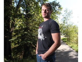 Former Calgary Herald journalist Heath McCoy, this year's Terry Fox Run ambassador, on the pathway near his Inglewood home Thursday, Sept. 10, 2015. Heath's wife Tamara Gignac was a beloved Herald scribe who died earlier this year from cancer.