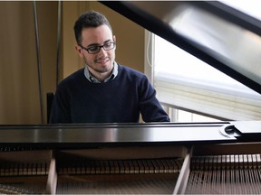 Italian pianist Luca Buratto, a  2015 Honens Piano Competition finalist, practises on a Steinway piano at the home of his hosts, Ann and Sandy Crawford.