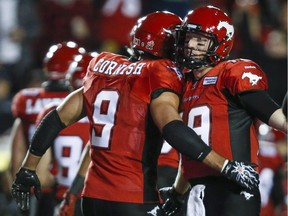 Calgary Stampeders' John Cornish, left, an Bo Levi Mitchell are ready for Friday's important game against the Winnipeg Blue Bombers.