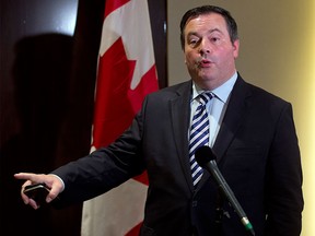 Jason Kenney speaks to reporters at a news conference Wednesday, Sept. 16, 2015  in Calgary.