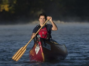 Liberal Leader Justin Trudeau paddles a canoe down the Bow River in Calgary earlier this month.