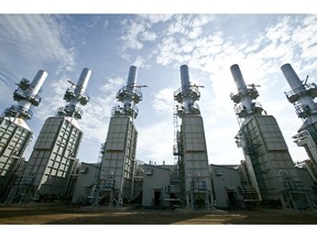 Devon Energy's Jackfish oilsands project steam generators. Completion of an expansion there is a factor cited Wednesday for a 15 per cent layoff.