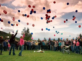 Residents of the Crowsnest Pass came together recently  to release balloons in Blairmore. Over 200 people remembered Terry Blanchette and his two-year-old daughter Hailey Dunbar-Blanchette who were murdered in the community in mid September.