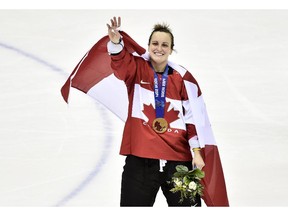 Canada's Marie-Philip Poulin waves to the crowd after scoring the game winning goal to defeat the United States during sudden death overtime women's hockey final action at the 2014 Sochi Winter Olympics in Sochi, Russia on Thursday, February 20, 2014.