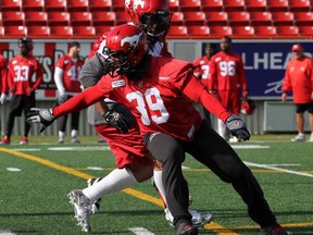 Calgary Stampeders defensive end Charleston Hughes practises at McMahon Stadium on Wednesday. Hughes and the rest of the Stamps are hoping Friday's game in Winnipeg isn't their last visit of the season to the Manitoba capital.