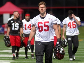 Calgary Stampeders offensive lineman Dan Federkeil walked off the field following practice on Thursday. He is making solid strides in coming back from a broken leg.