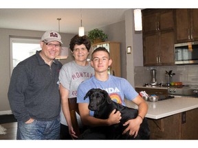 Mike and Sandra Dimitrijevic with their son Nikholas and dog.