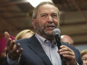 Federal NDP Leader Tom Mulcair speaks to supporters while making a campaign stop in Calgary, on Sept. 15, 2015.