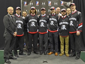 The Roughnecks pose with their draft class in Toronto on Monday night (minus top pick Wesley Berg, who wasn't there). From left, assistant coach Bruce Codd, Jordan Kancsal (44th overall), GM Mike Board, Tyson Bell (24th), Reilly O'Connor (7th), Mitch de Snoo (13th), scout Brian Beisel, Jacob Ruest (35th), head coach/assistant GM Curt Malawsky and Kellen LeClair (25th).