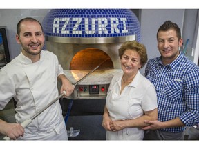 The Ricioppo family, Terry, centre, with her sons, Fausto, right, and Alessandro at their Azzurri Pizzeria on Edmonton Trail NE in Calgary, on September 24, 2015. --  (Crystal Schick/Calgary Herald) (For Food story by  John Gilchrist) 00068754A