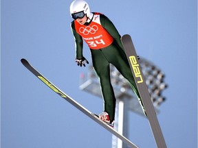 Canada's Mackenzie Boyd-Clowes competes during the Men's Ski Jumping Normal Hill Individual Official second Training at the RusSki Gorki Jumping Center few hours before the start of the Sochi Winter Olympics Games on February 7, 2014, in Rosa Khutor near Sochi.