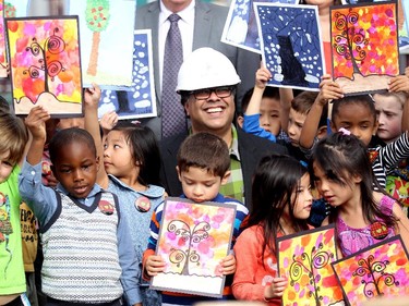 Calgary Mayor Naheed Nenshi joined Grade 1 students from St. Jerome School during a ceremony to celebrate the replanted trees at the school on September 10, 2015. The ceremony was held on the year anniversary of Snowtember which saw damage to more than 50 per cent of Calgary's urban canopy.