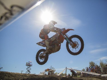 Ty McKenna, of the amateur category, launches off a jump as he competes in Canada's only Urban Endurocross Challenge, the Red Bull Rocks & Logs at Wild Rose MX park in Calgary, on September 12, 2015.