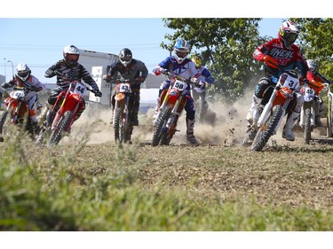 Riders of all skills and ages compete in Canada's only Urban Endurocross Challenge, the Red Bull Rocks & Logs at Wild Rose MX park in Calgary, on September 12, 2015.