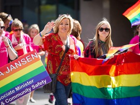 MLA Sandra Jansen walks the parade route during the 24th Annual Pride Parade on 8th Avenue in downtown Calgary on August 31st, 2014.