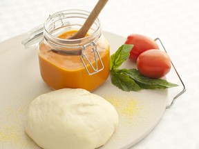 Freezer Tomato Sauce can be used on pasta and pizzas.