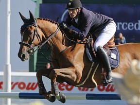 Gregory Wathelet from Belgium riding Algorythem won the CANA Cup at the Spruce Meadows Masters on Thursday.