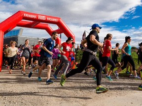 Runners take off at the start of the annual Terry Fox Run at Telus Spark in Calgary on Sunday, Sept. 20, 2015.