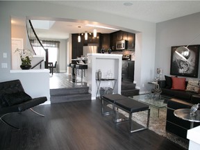 The sunken great room in the Belvedere II show home by Brookfield Residential in Auburn Bay.