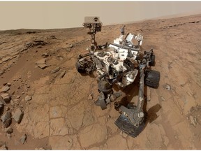 This photo released by NASA shows a self-portrait taken by the NASA rover Curiosity in Gale Crater on Mars. Measurements of the Martian air by the rover found it's mostly made of carbon dioxide with traces of other gases, according to two studies appearing in the Friday, July 19, 2013 issue of the journal Science. (AP Photo/NASA)