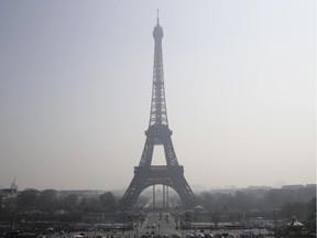The Eiffel Tower in central Paris is seen through a haze of pollution.