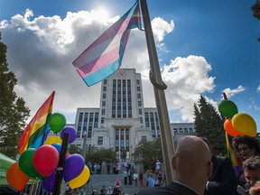 Vancouver mayor Gregor Robertson and members of the local LGBTQ community raised a transgender pride flag at City Hall on July 27 to mark the start of Pride week.