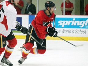 Calgary Flames centre Josh Jooris skates during a scrimmage during the teams training camp at Winsport on September 18, 2015.