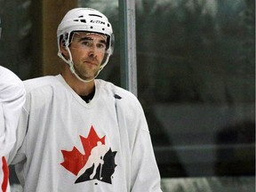 Former Calgary Hitmen star Brad Moran skates with Calgary Flames players and other pros in an informal practise at the WinSport arenas on Tuesday.