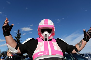 Calgary stampeders fan Shane Schiller dresses as a storm trooper to watch the Calgary Stampeders take on the Edmonton Eskimos in Calgary on October 10, 2015 at McMahon Stadium.