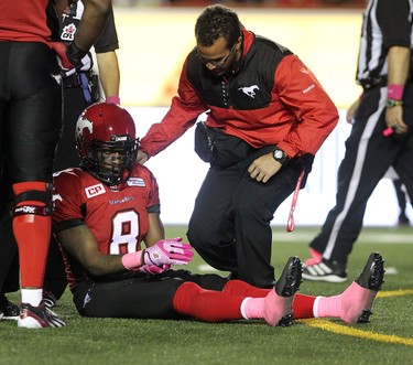 Calgary Stampeders Fred Bennett is injured during their game against the Edmonton Eskimos at McMahon Stadium in Calgary on October 10, 2015 .
