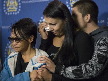 Family members of homicide victim Christa Cachene, pictured from left, her mother Nancy Cachene, sister Jaci and brother AJ, speak to media and reach out to the public in Calgary, on October 14, 2015.