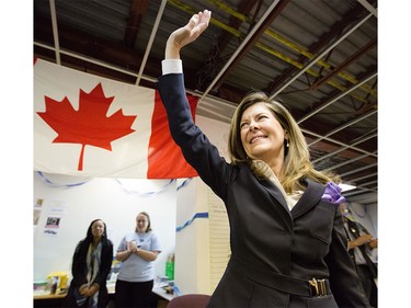 Joan Crockatt waves to her supporters at her campaign headquarters in Calgary on Monday, Oct. 19, 2015.