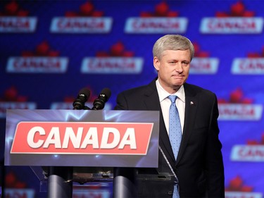 Prime Minister Stephen Harper leaves the stage after his speech to the crowd at the Conservative HQ in Calgary on Oct. 19, 2015 after losing the federal election .