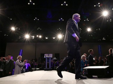 Prime Minister Stephen Harper leaves the stage after his speech to the crowd at the Conservative HQ in Calgary on Oct. 19, 2015 after losing the federal election .