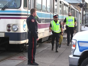 Calgary Police Service members were on the scene after a fatal pedestrian CTrain accident at the Chinook LRT station on Oct. 21, 2015.