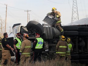 A man in his 40s was taken to hospital in life-threatening condition after his trailer was hit by a train in the S.E. of Calgary on Oct. 26, 2015.