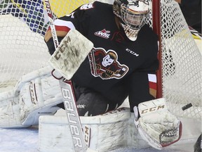 Former Hitmen goalie Mack Shields recorded a shutout of his old team on Wednesday night, leading the Prince George Cougars to a 5-0 triumph.
