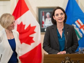 Alberta Premier Rachel Notley, left, smiles after appointing Danielle Larivee as Minister of Municipal Affairs and Minister of Service Alberta last month.