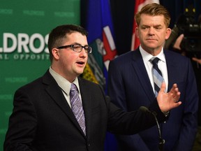 Wildrose Leader Brian Jean, right, and party House Leader Nathan Cooper.