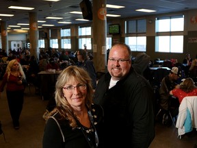 Debbie Newman (left), Drop-In Centre executive director, pictured with Mark Powers, at the homeless shelter on Nov. 17, 2014.