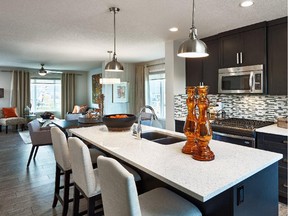 The kitchen in the Columbia show home at Vantage Fireside, by Calbridge Homes, in Fireside, Cochrane.
