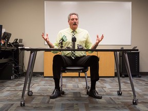 Marc Halat, manager of compliance services with the City of Calgary, talks to media about the ongoing compliance and ticketing issues with Uber, the ride sharing taxi service, in Calgary, on Oct. 30, 2015.